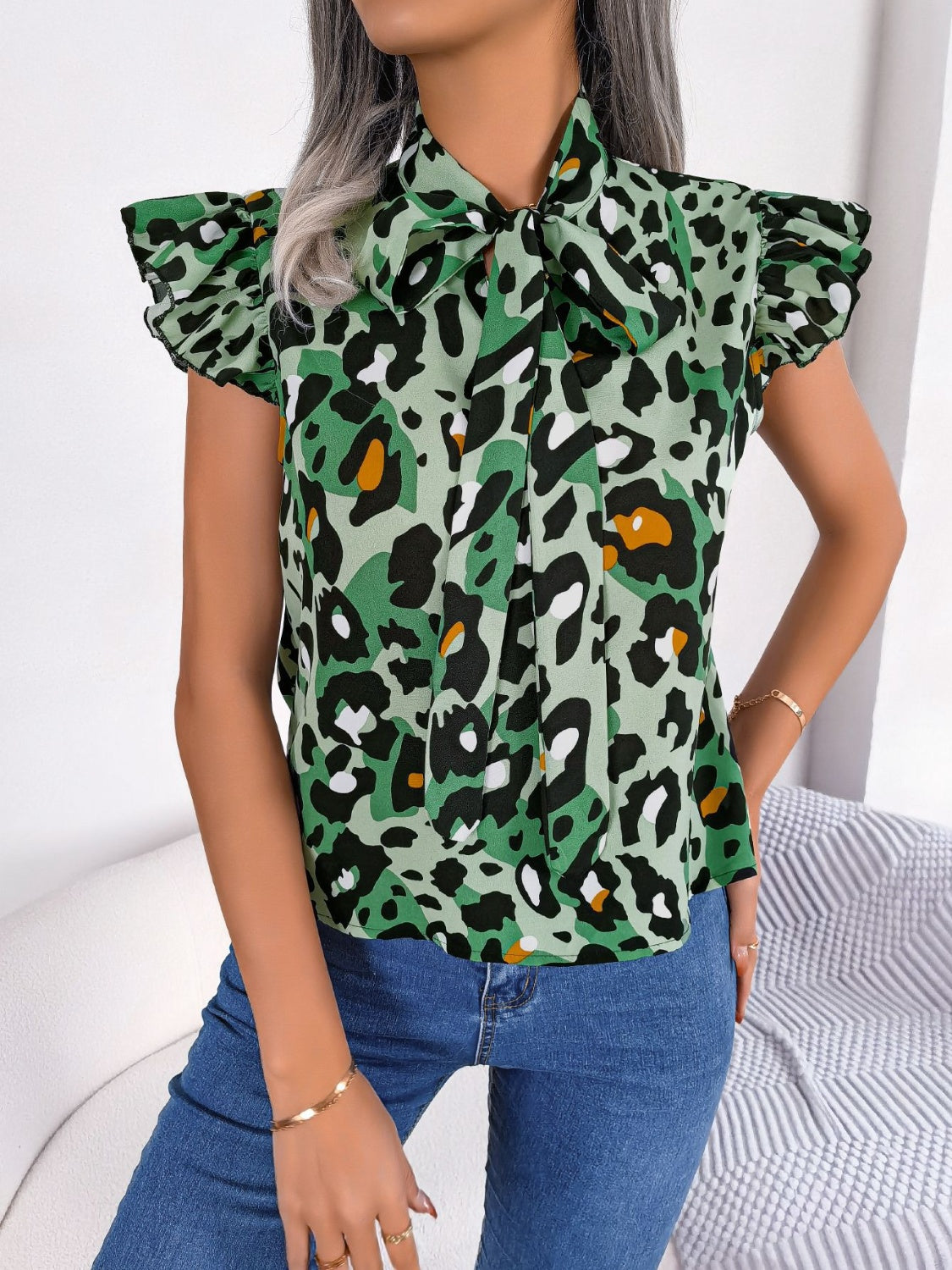 Leopard Tie Neck Cap Sleeve Blouse