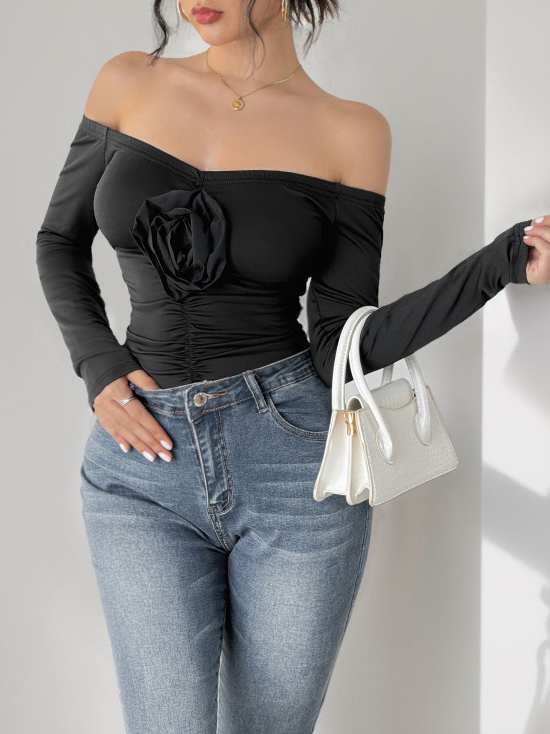 Perfee Ruched Flower Off-Shoulder Long Sleeve Bodysuit