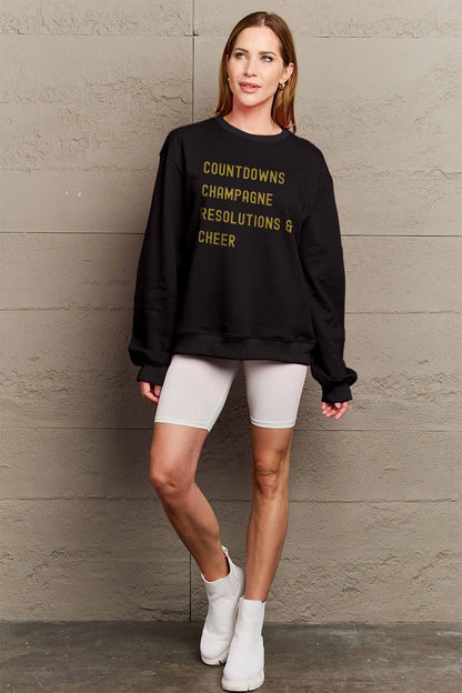 Simply Love Full Size COUNTDOWNS CHAMPAGNE RESOLUTIONS &amp; CHEER Round Neck Sweatshirt